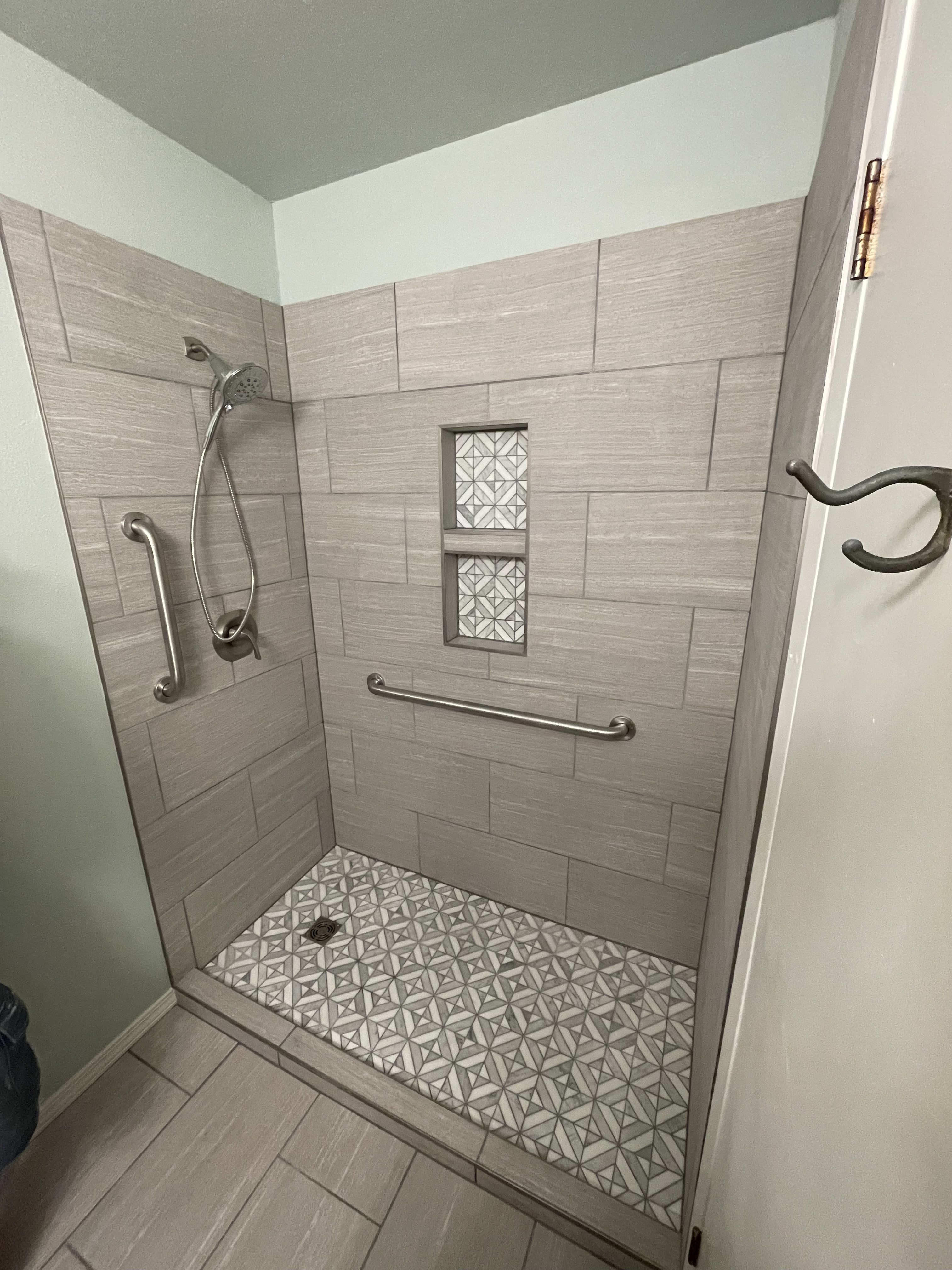 Accessible curbless shower bathroom remodel by Lorett's Remodeling and Construction in Tulsa, OK