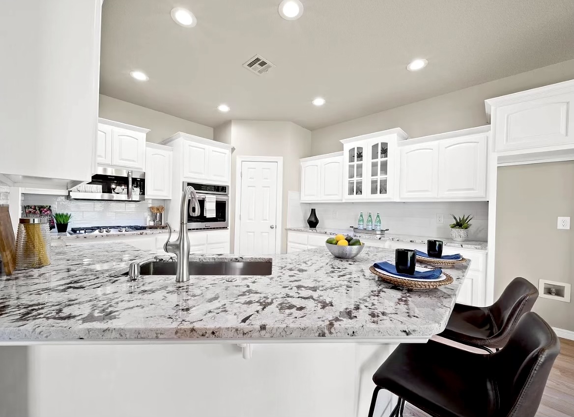 Quartz kitchen island countertop by Lorett's Remodeling and Construction in Tulsa, OK