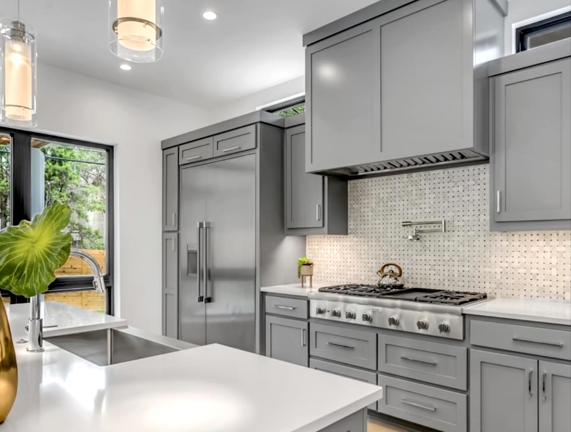Grey shaker cabinet kitchen remodel with stainless appliances by Lorett's Remodeling and Construction in Tulsa, OK